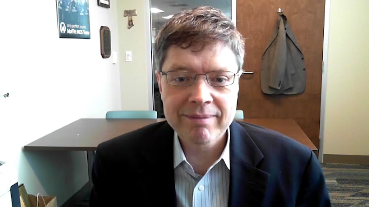 Why is genetic testing key following an acute myeloid leukemia diagnosis?